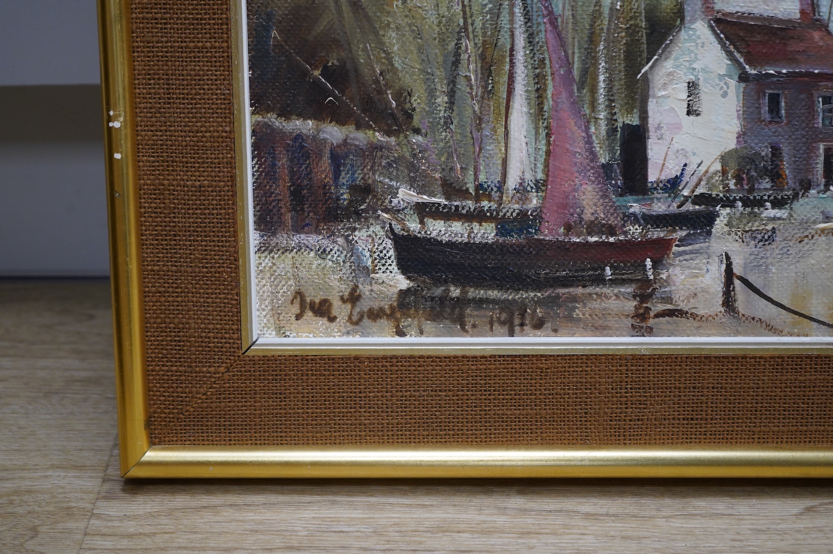 Ira Englefield (b.1912), Harbour view with moored fishing boats, signed and dated 1976, oil on canvas, 39 x 80cm